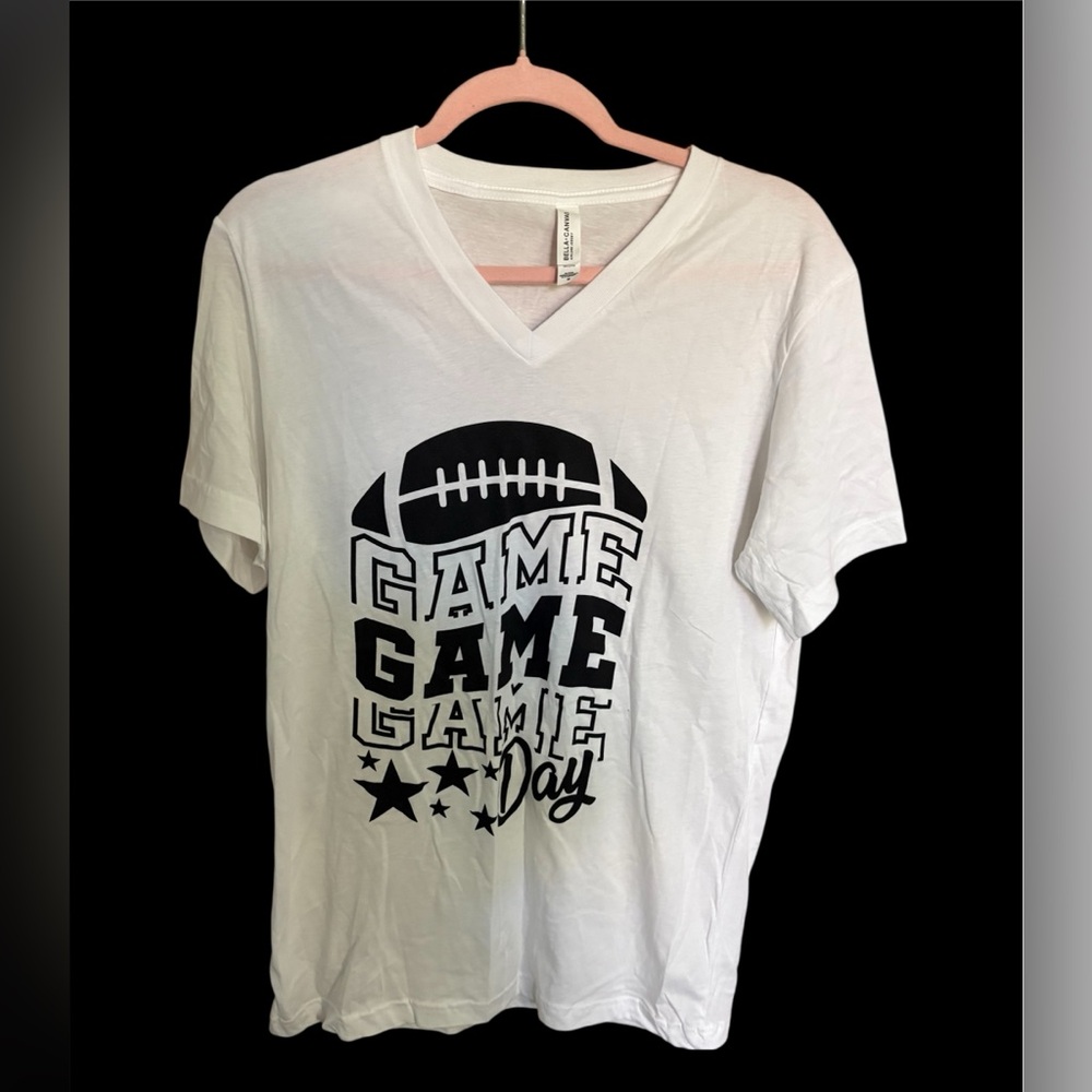 Bella + Canvas “Game Game Game Day” Football Graphic V-Neck Tee – White